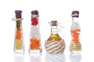 Decorative preserved vegetables and oil clipart