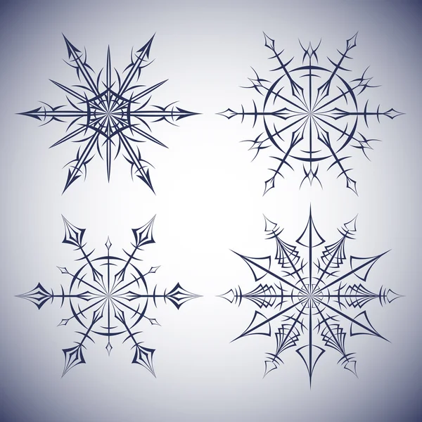 Ensemble de flocons de neige ethniques — Image vectorielle