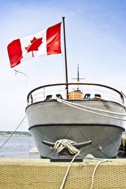 Canadian boat at harbor clipart