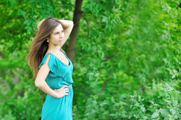 Beautiful woman looking on copyspace outdoors — Stock Photo, Image