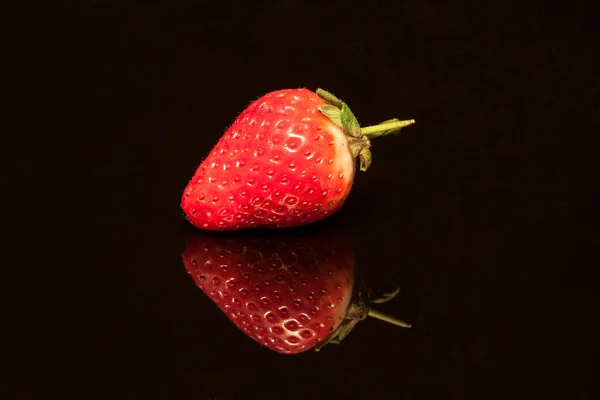 stock image Strawberry isolated on black