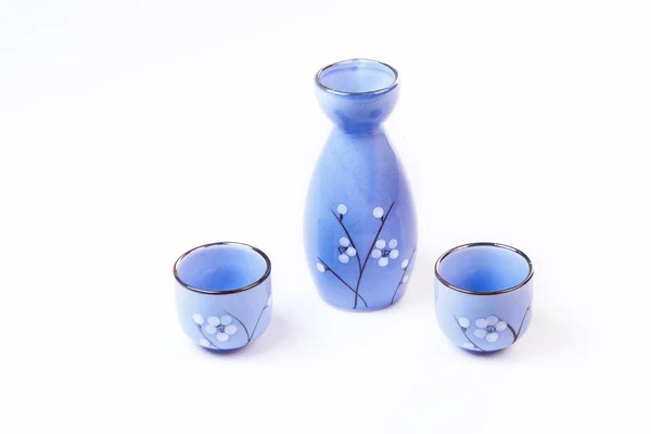 Traditional oriental style Sake set from a jug ahd bowl cups — Stock Photo, Image