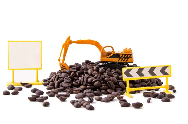 Retroexcavadora y granos de café (2 ) —  Fotos de Stock