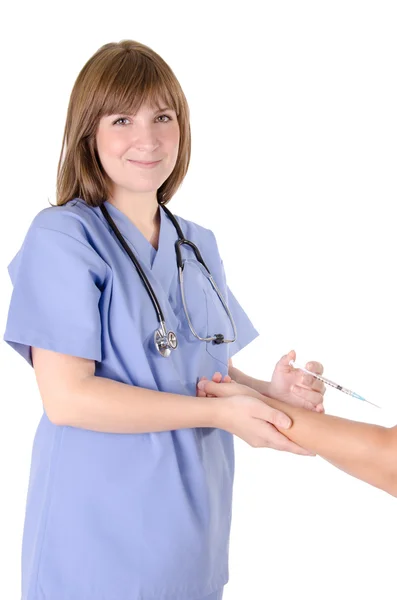 Junge Krankenschwester und Spritze — Stockfoto