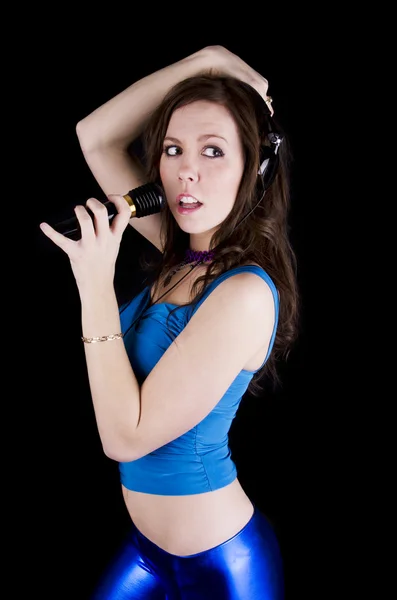 Młoda kobieta z mikrofonem — Zdjęcie stockowe