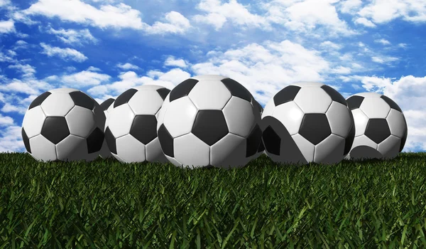 Soccer ball on a green grass — Stock Photo, Image
