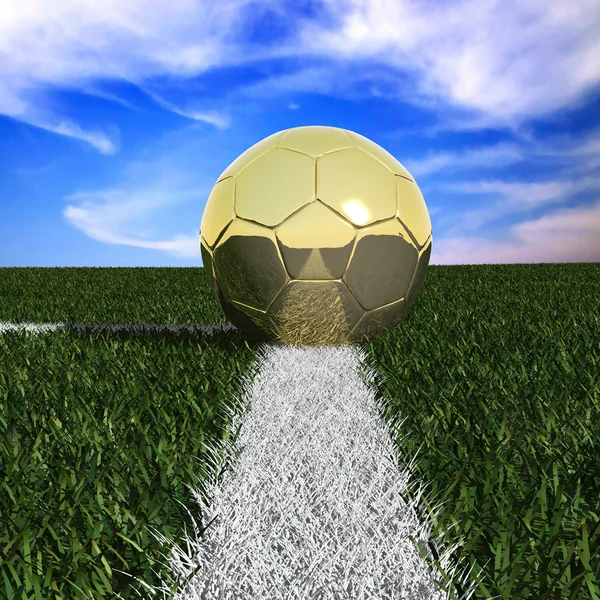 Golden soccer ball in the grass — Stock Photo, Image