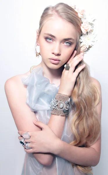 Portrait of beautiful young teenager girl in jewelery weared blu — Stock Photo, Image