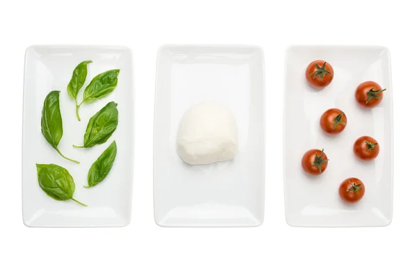 stock image Italian food like flag, basil mozzarella tomato on white