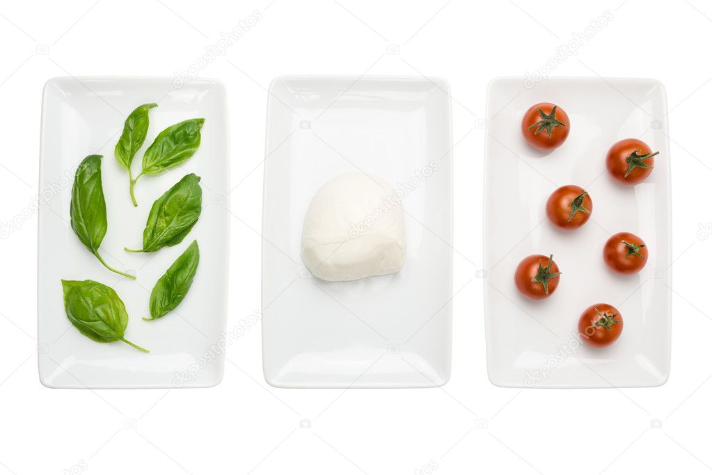 Italian food like flag, basil mozzarella tomato on white
