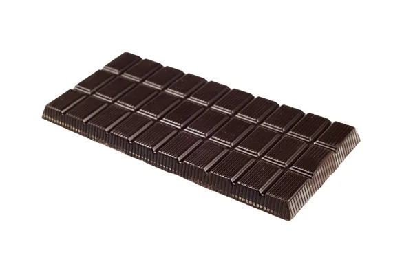 Tableta oscura de chocolate aislada sobre fondo blanco — Foto de Stock