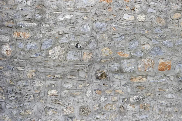 Stenen metselwerk muur patroonopvullingen en — Stockfoto