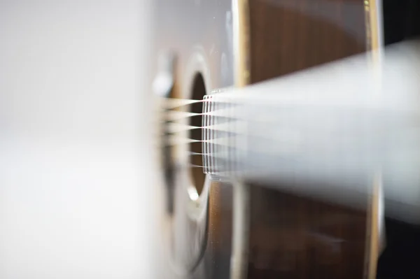 Вид збоку акустичної західної гітари Стокове Зображення