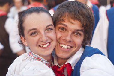 Smiling poland folk couple clipart