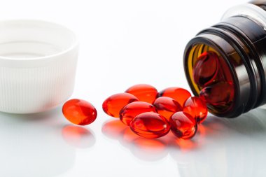 Vitamin E capsules clipart