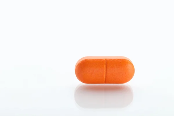 Pillola arancione Foto Stock Royalty Free