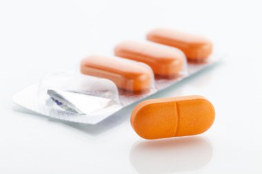 Orange pills clipart