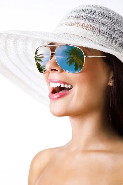 stock image Sexy brunette with white hat and sunglasses smiling