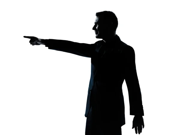 Un uomo d'affari poiting silhouette — Foto Stock