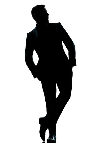 Один бізнесмен стоїть на повній довжині руки в кишеньковому силуеті — стокове фото