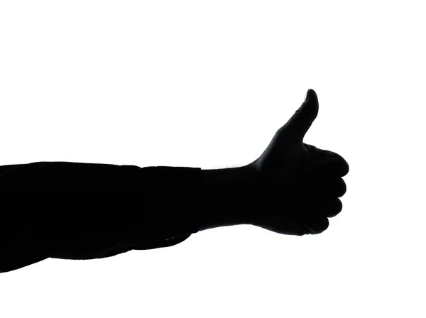Close up detail one man hand silhouette thumb up gesture — Stock Photo, Image