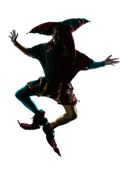 Uomo in costume giullare silhouette jumping — Foto Stock