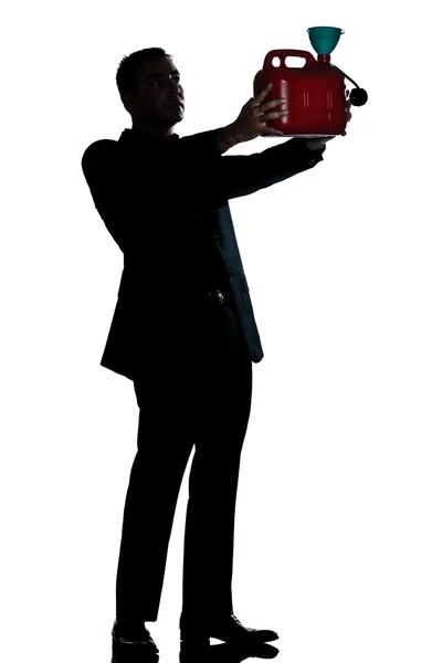 Silhouette man full length out of gas begging — Stock Photo, Image