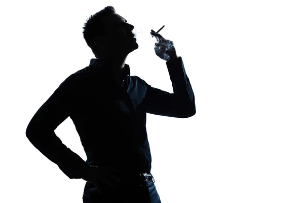 Silhouette man portrait smoking cigarette — Stock Photo, Image