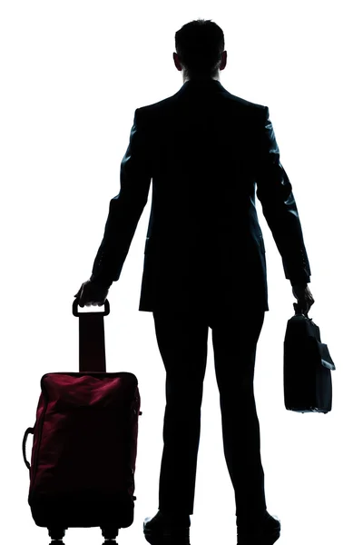 Σιλουέτα επιχειρηματίας ταξιδιώτης με βαλίτσα πίσω όψη — Φωτογραφία Αρχείου