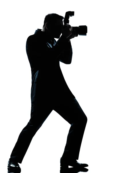 Sylwetka człowieka pełnej długości fotograf — Zdjęcie stockowe