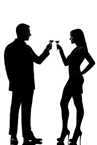 stock image One couple man and woman drinking red wine toasting