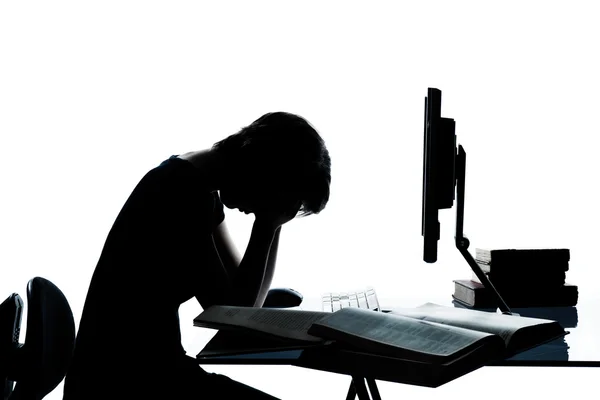One caucasian young teenager silhouette boy or girl studying with computer computing laptop — Stock Photo, Image