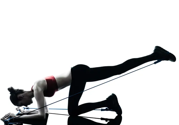 Frau turnt Gymnastik — Stockfoto
