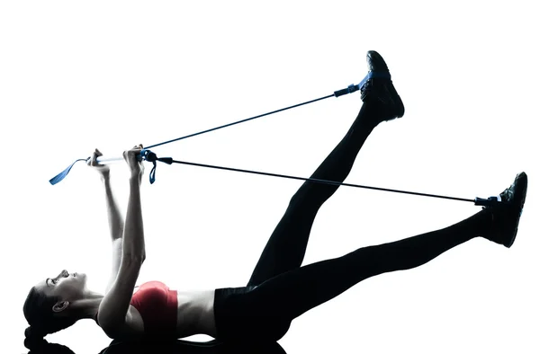 Kvinna utövar gymstick — Stockfoto
