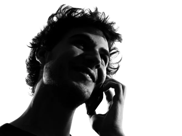Молодий чоловік силует телефону — стокове фото