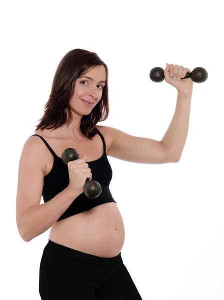 Schwangere trainieren mit Hanteln — Stockfoto