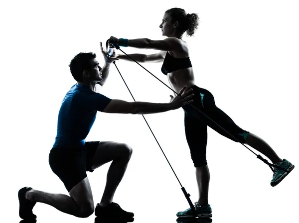 Man woman exercising gymstick workout fitness — Stock Photo, Image