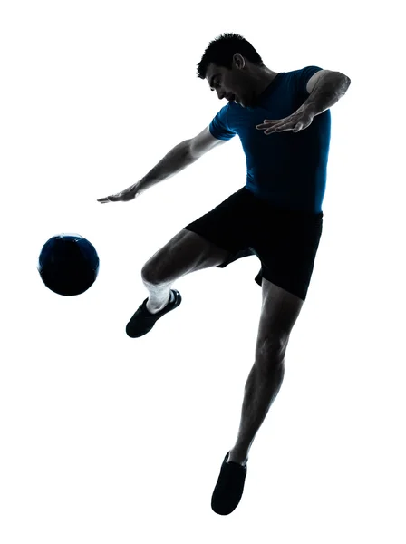 Giocatore di calcio uomo volare calci — Foto Stock