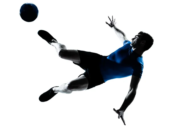 Hombre fútbol jugador de fútbol vuelo patadas —  Fotos de Stock