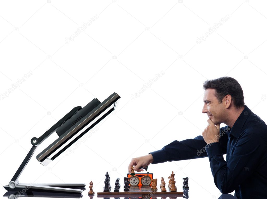 Caucasian man playing chess computer hi-res stock photography and