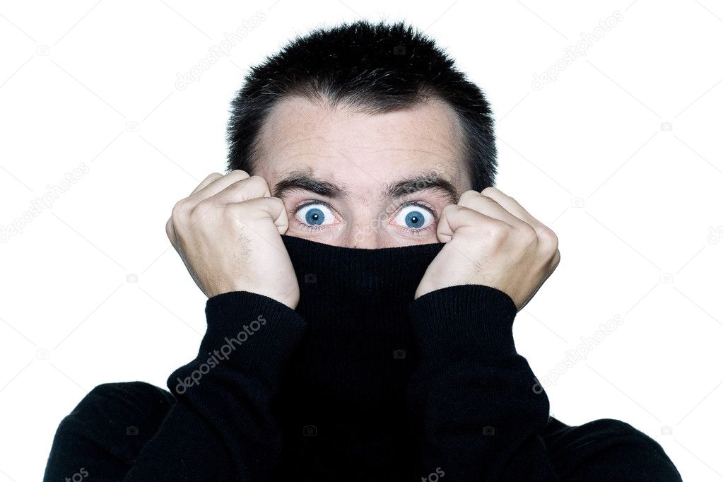 Shy man surprised anonymous hiding behind his pull over