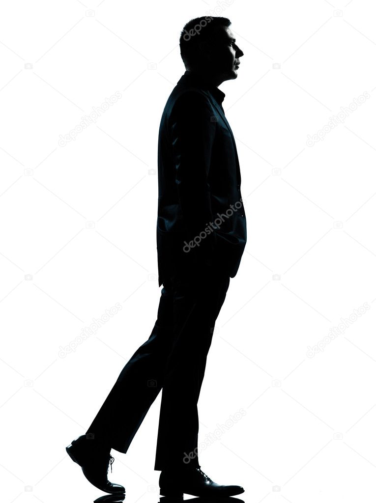 One business man walking silhouette
