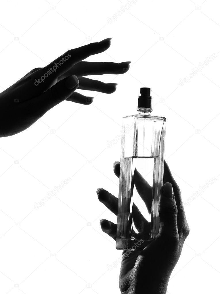 Detail close-up silhouette woman hands with perfume — Stock Photo ...