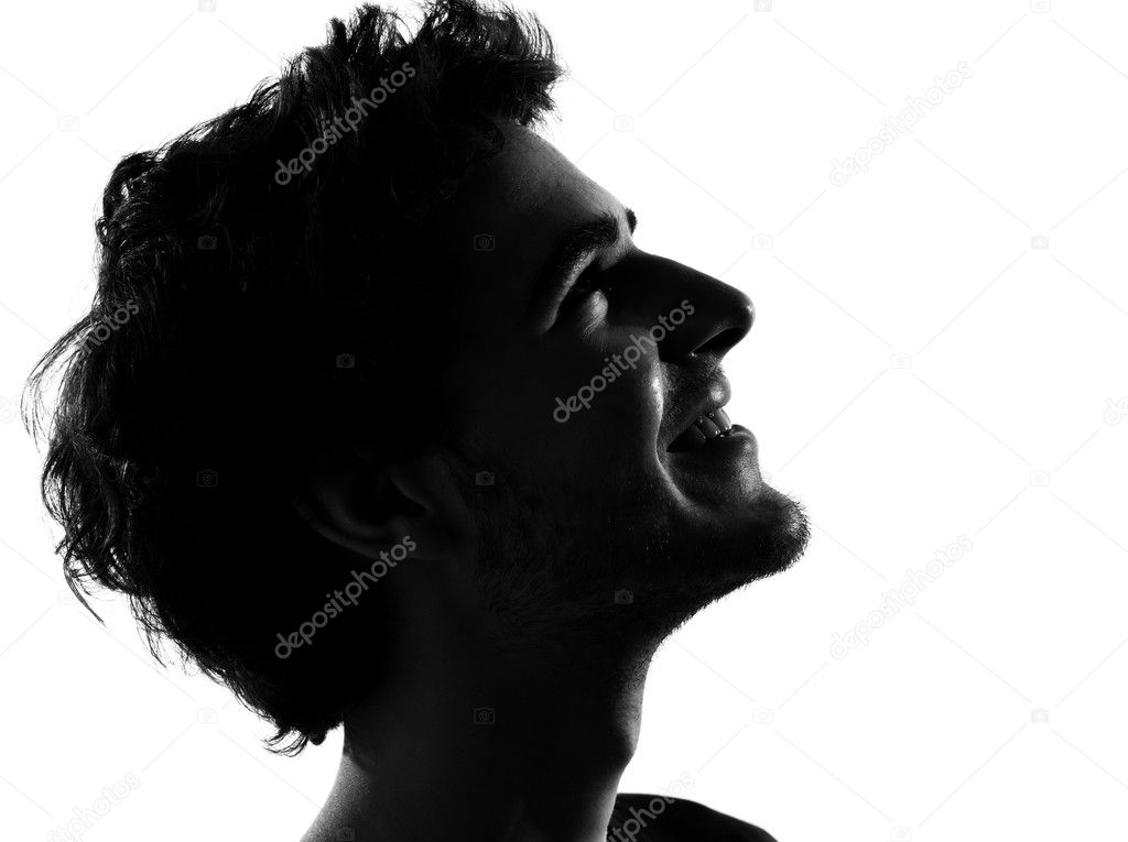 Young man silhouettes miling happy