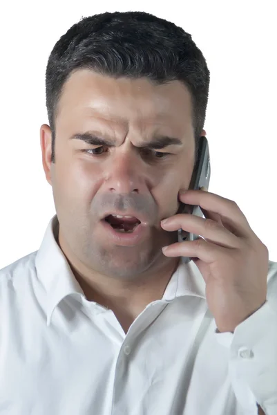 Çekici bir adam cep telefonda konuşurken — Stok fotoğraf