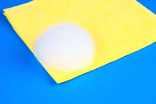 Yellow microfiber duster with foam — Stock Photo, Image