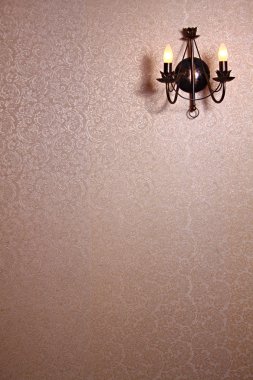 Stylish lamp on the wallpaper clipart