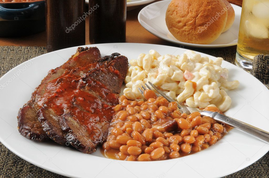 Sliced beef brisket with Boston baked beans