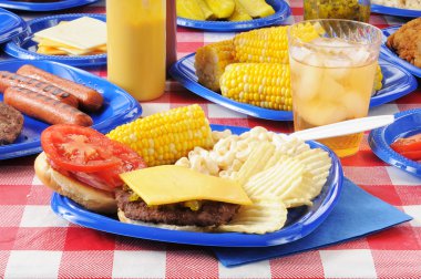 Cheeseburger on a picnic table clipart