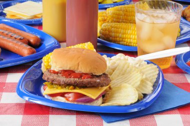 Cheeseburger with potato chips clipart